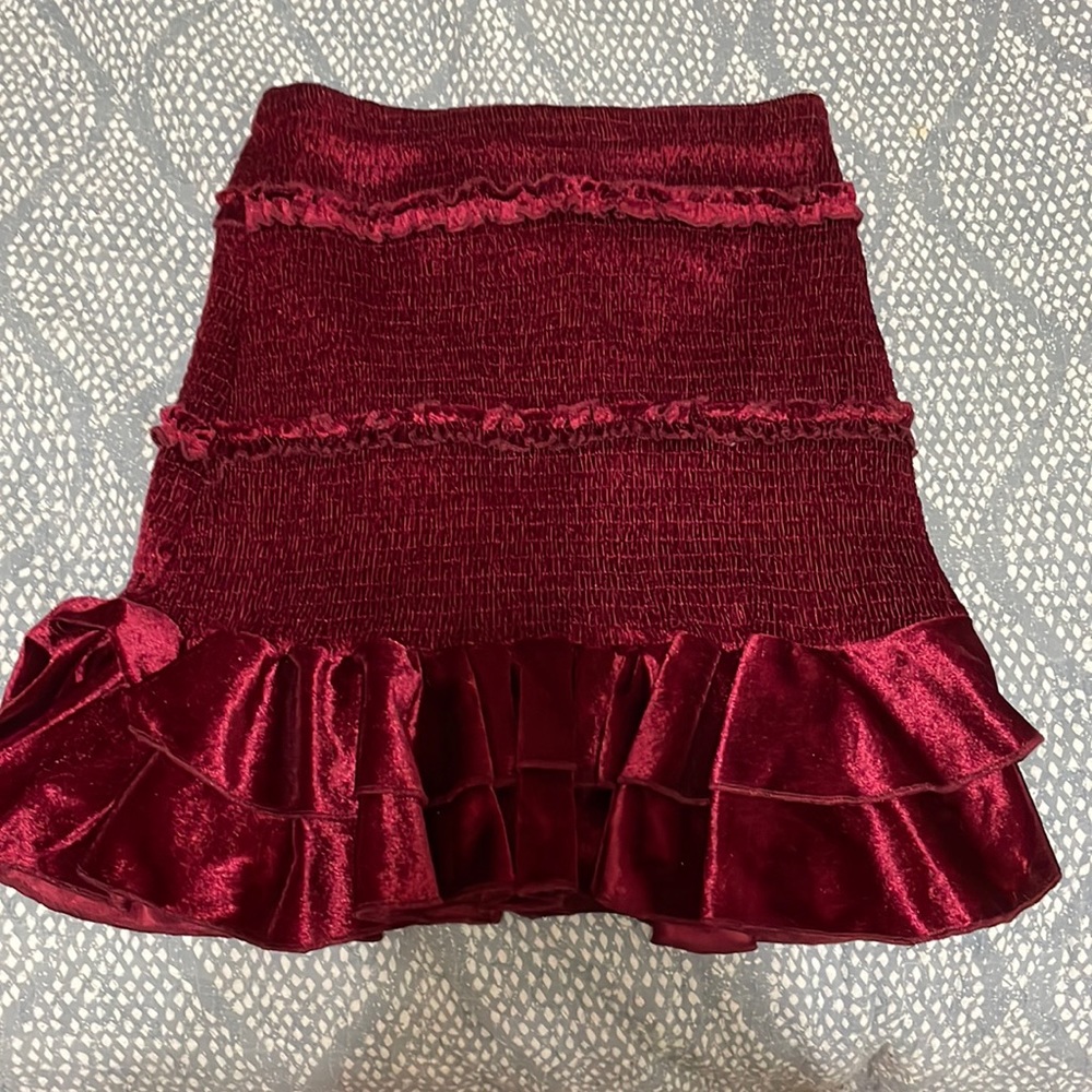 Papaya red velvet skirt, worn once. Size medium.